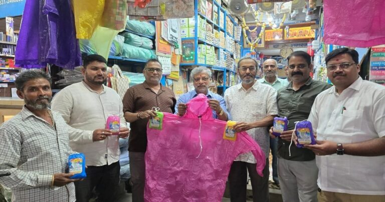 distribution of raincoats to participating members of sakal morcha
