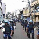 rapid action force and shahapur police conduct a route march in the city