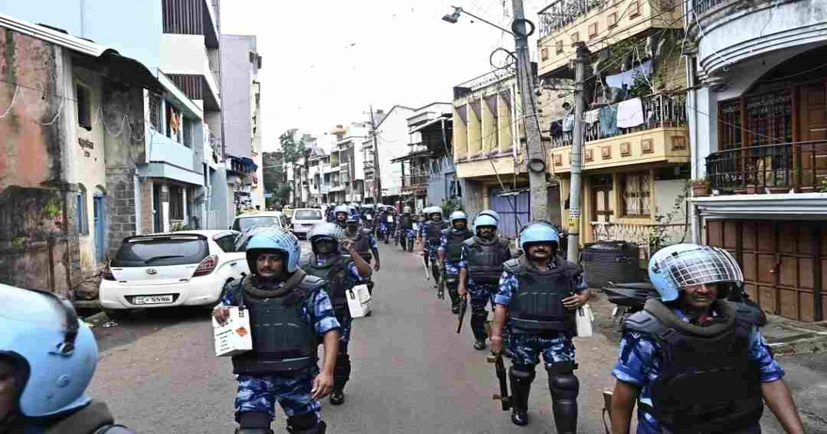 rapid action force and shahapur police conduct a route march in the city