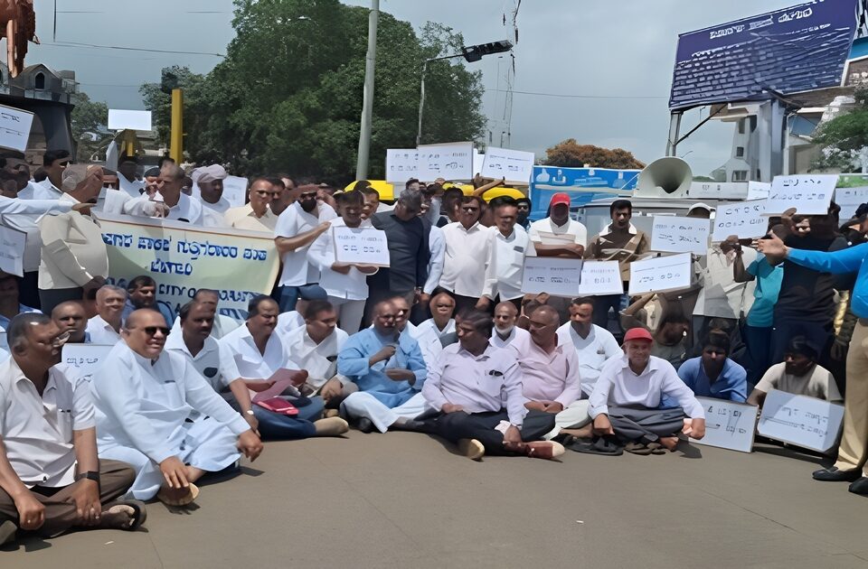 contractors march to the district collector's office against the package tender system