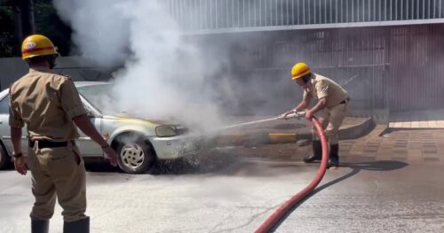 car catches fire on college road