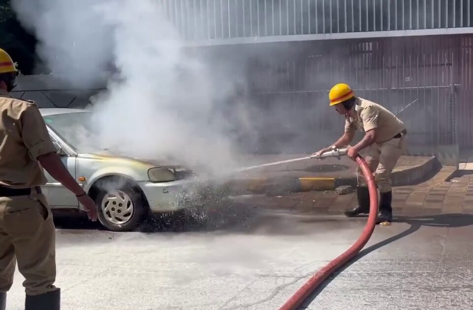 car catches fire on college road