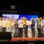 gift presentation by former students of b. k. model