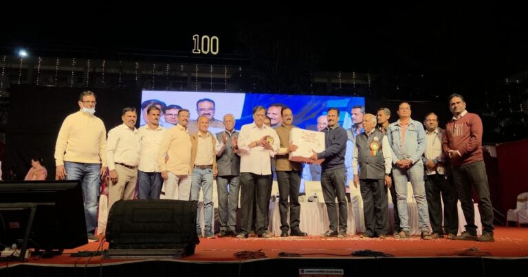 gift presentation by former students of b. k. model